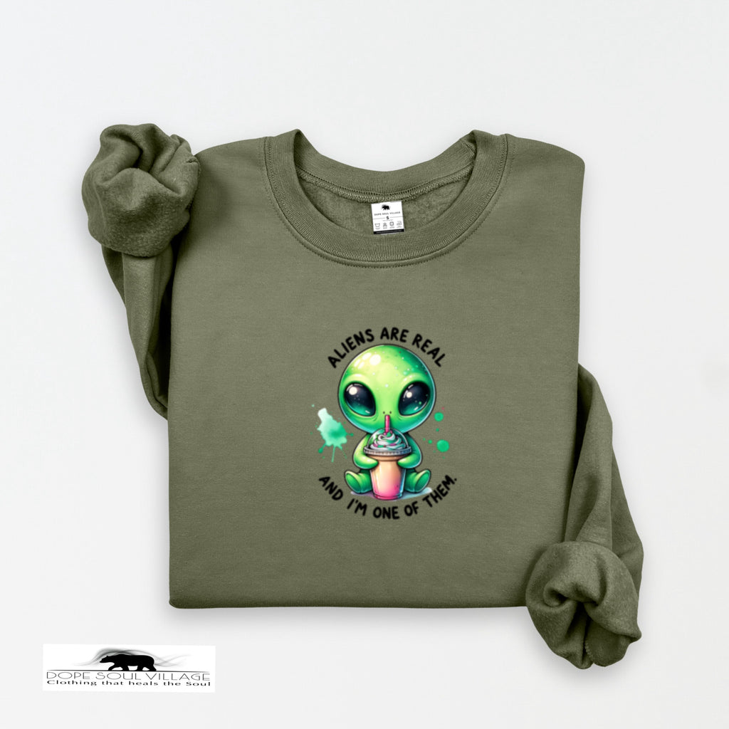 Green sweatshirt with alien graphic and text on a white background Dope Soul Village
