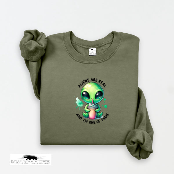 Green sweatshirt with alien graphic and text on a white background Dope Soul Village