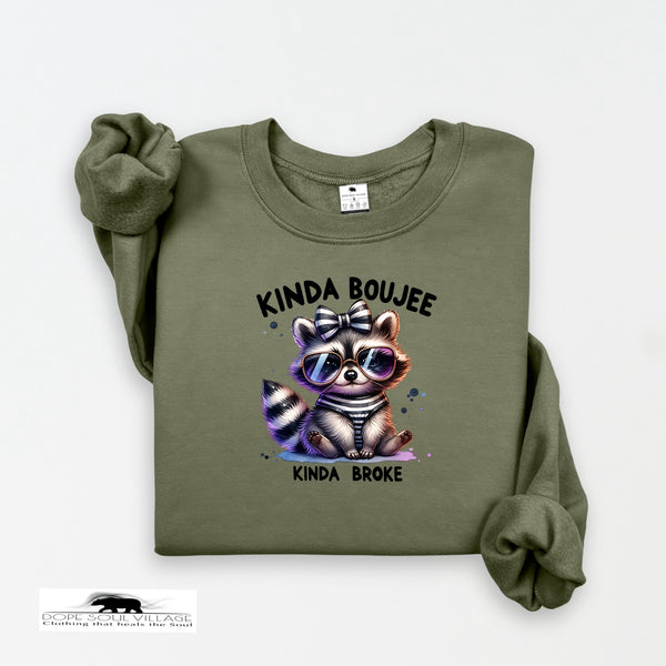 Green sweatshirt with a raccoon graphic and text on a white background