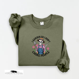 Green sweatshirt with a graphic design on a white background