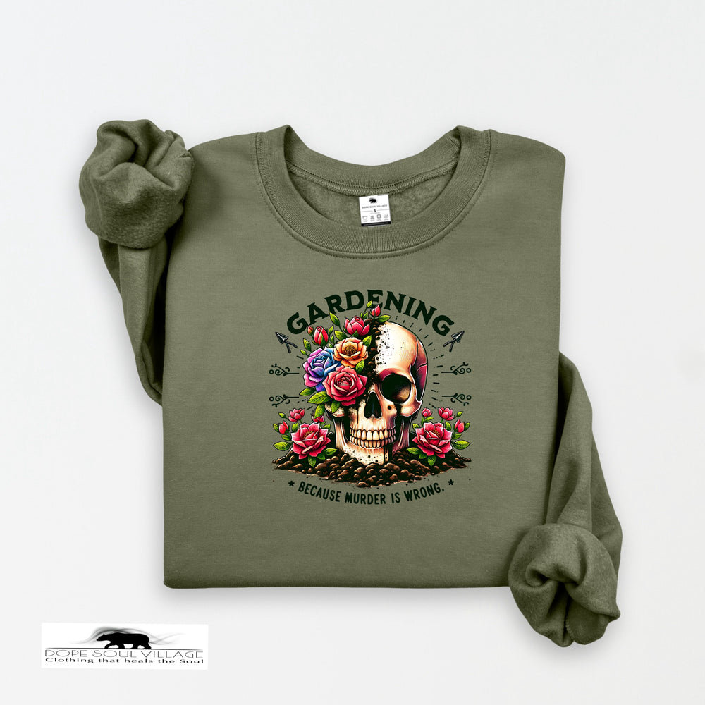 Green sweatshirt with skull and floral design on a white background