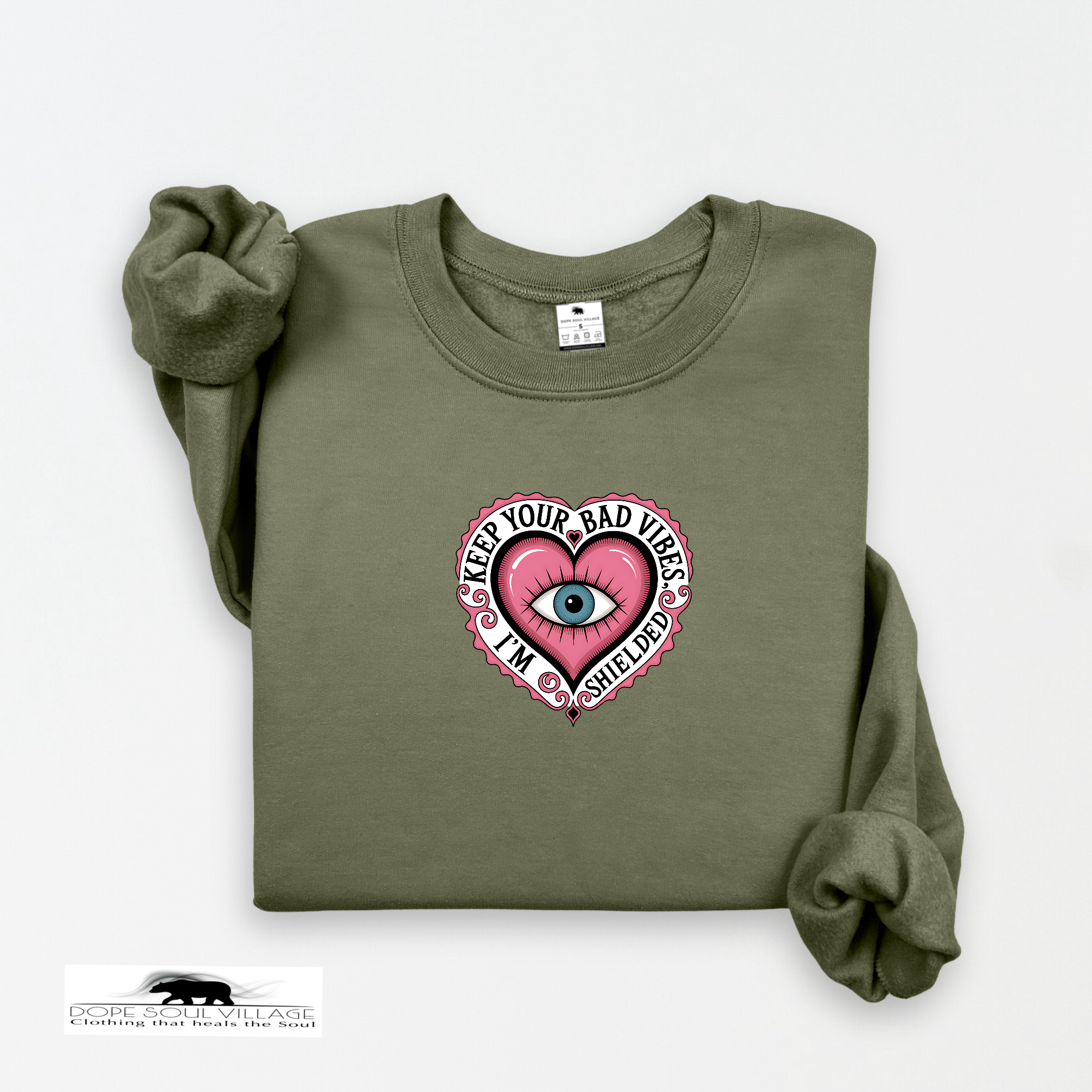 Green sweatshirt with a graphic design on a white background