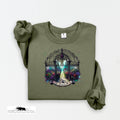 Green sweatshirt with a garden graphic on a white background
