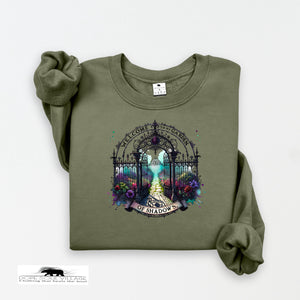 Green sweatshirt with a garden graphic on a white background