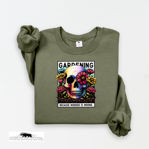 Green sweatshirt with a colorful skull design and text on a white background