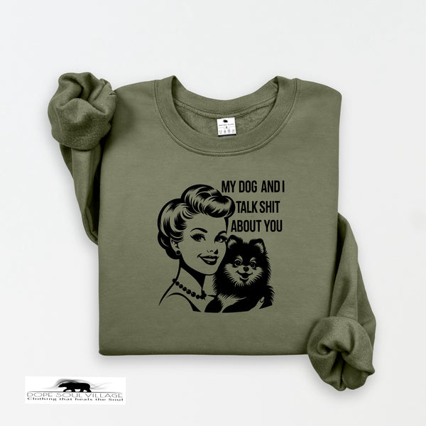 Green sweatshirt with graphic of a woman and dog and text on a white background