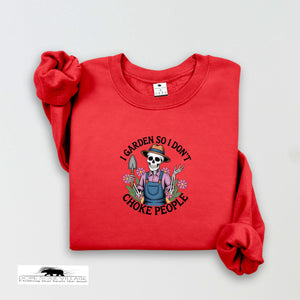 Red sweatshirt with a graphic design on a light gray background