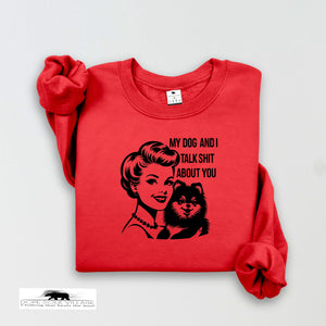 Red sweatshirt with graphic design and text on a white background