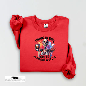Red sweatshirt with skeleton graphic and text on a white background