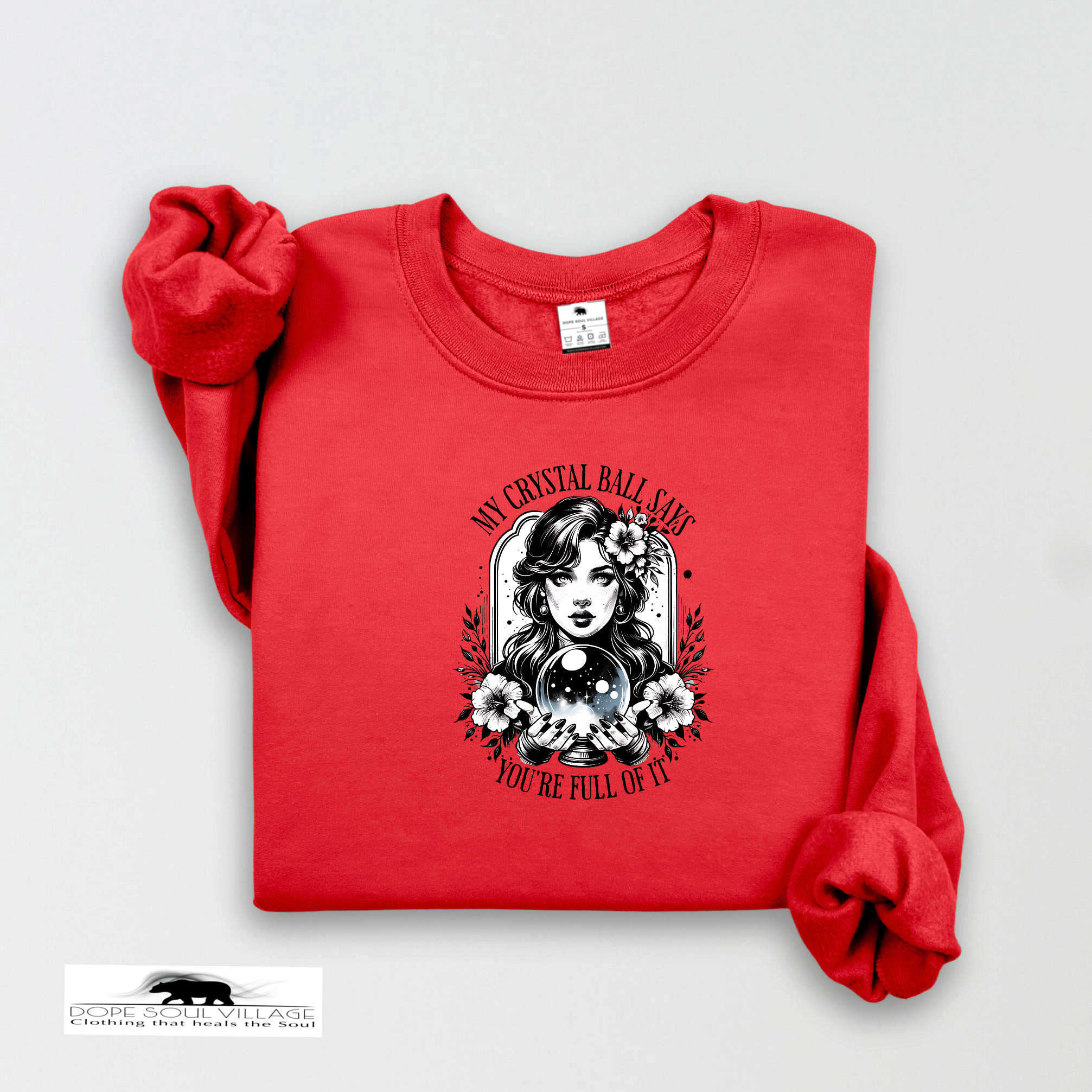 Red sweatshirt with a graphic design on a light gray background