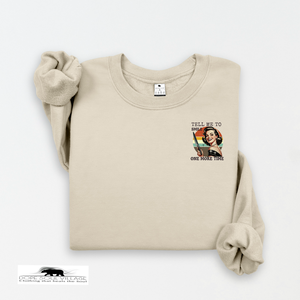 Beige sweatshirt with graphic design on a white background