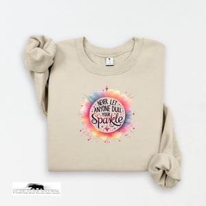 Beige sweatshirt with colorful graphic and text on a white background