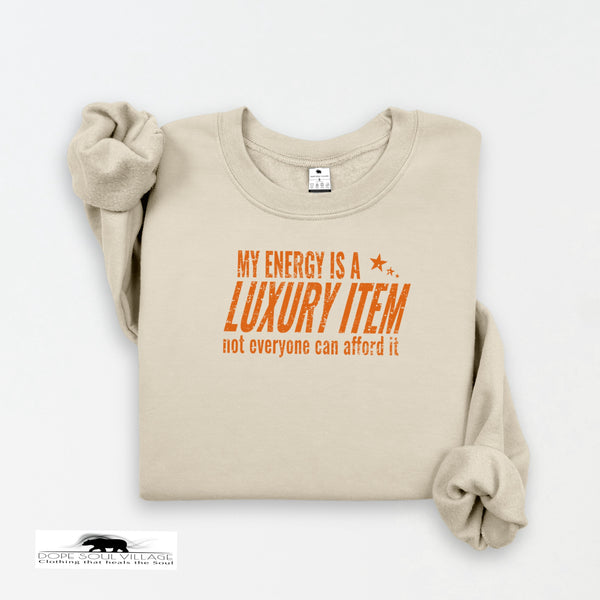 Beige sweatshirt with orange text on a white background