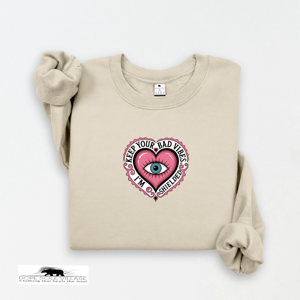 Beige sweatshirt with a graphic design on a white background