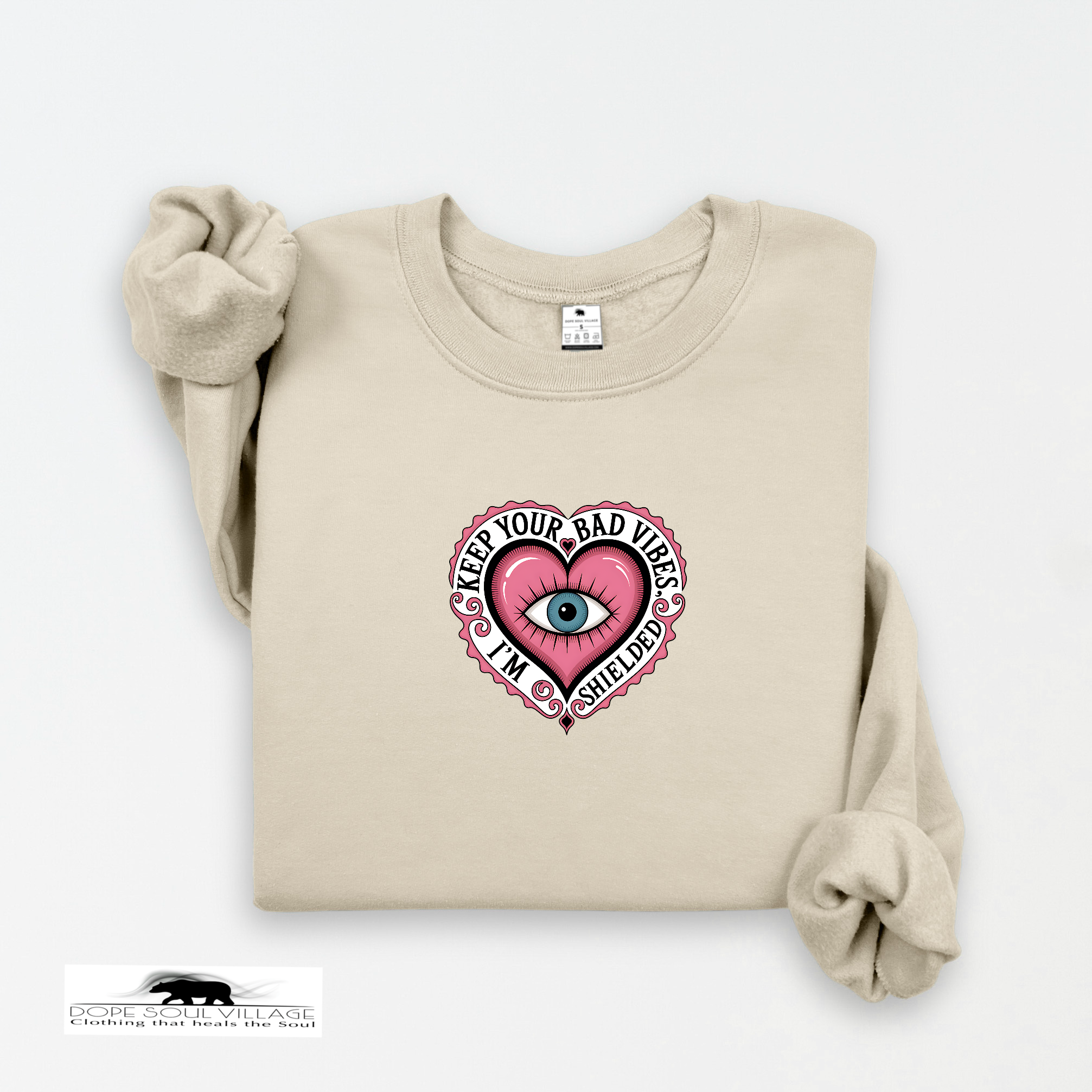 Beige sweatshirt with a graphic design on a white background