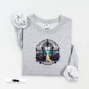 Gray sweatshirt with a colorful graphic design on a white background