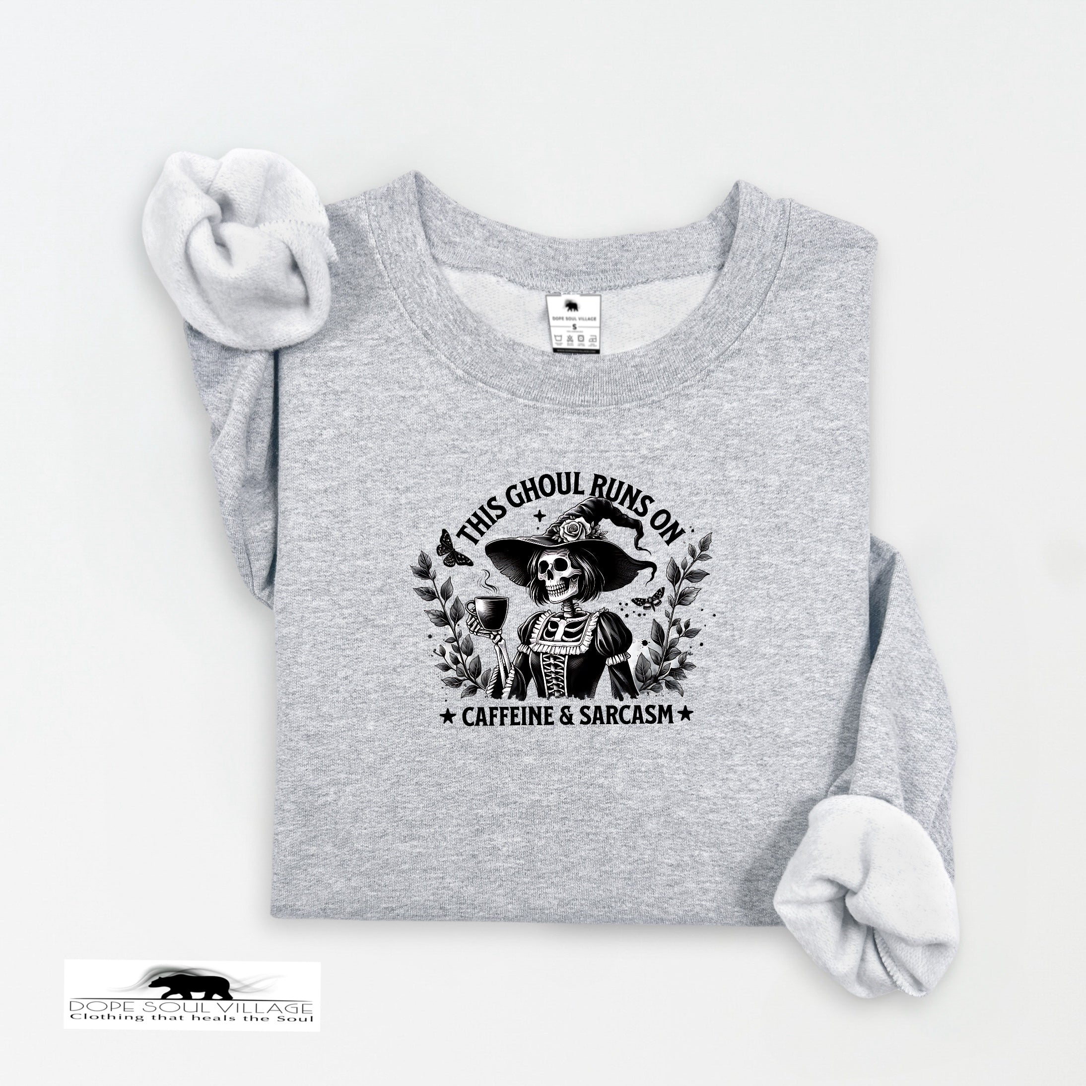 Gray sweatshirt with a graphic design and text on a white background