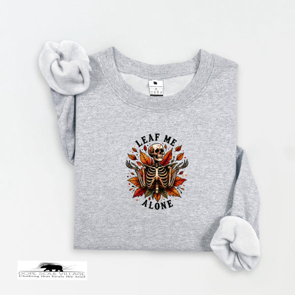 Gray sweatshirt with a skeleton and leaf design on a white background