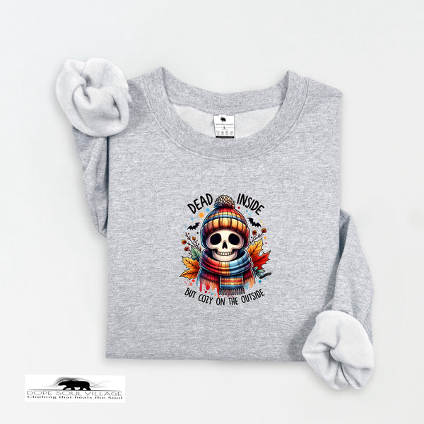 Gray sweatshirt with a skull wearing a hat and scarf graphic on a white background