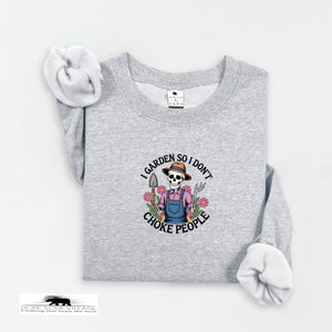 Gray sweatshirt with a skull wearing a hat and overalls graphic and text on a white background