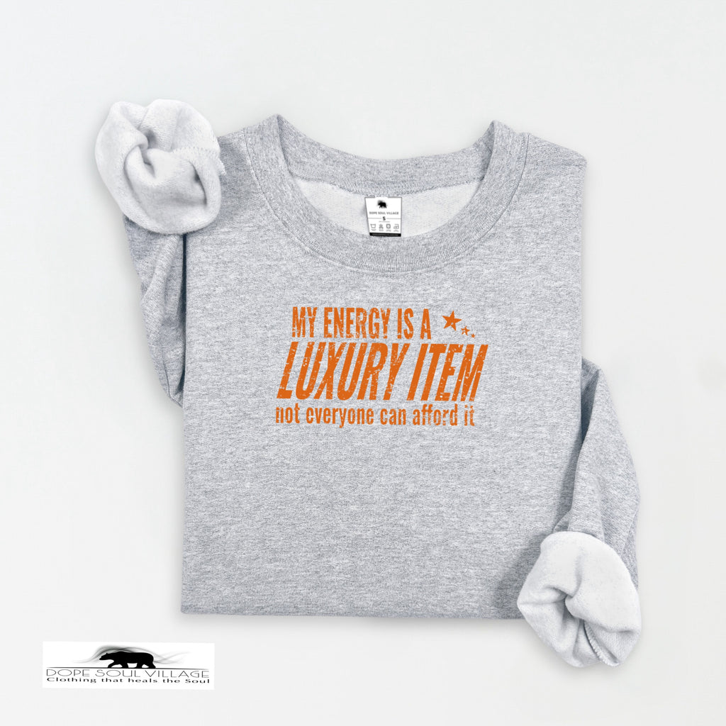 Gray sweatshirt with orange text on a white background