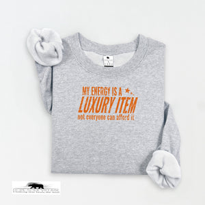 Gray sweatshirt with orange text on a white background