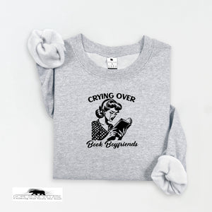 Gray sweatshirt with a graphic and text on a white background
