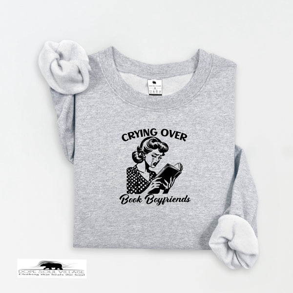 Gray sweatshirt with a graphic and text on a white background