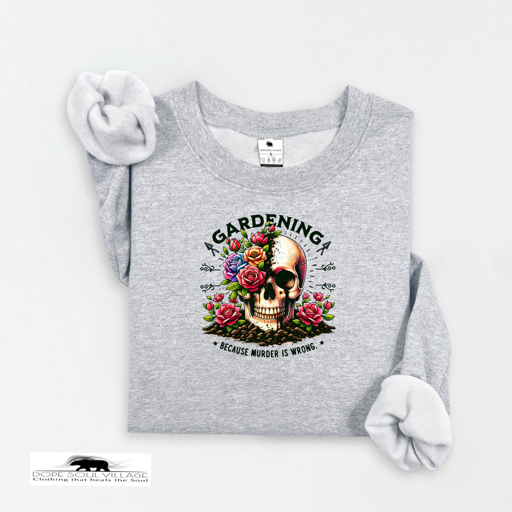 Gray sweatshirt with a skull and flowers design and text on a white background