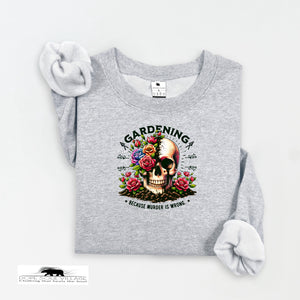 Gray sweatshirt with a skull and flowers design and text on a white background