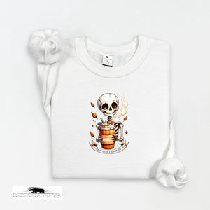 White t-shirt with a skeleton holding a beer mug design on a white background