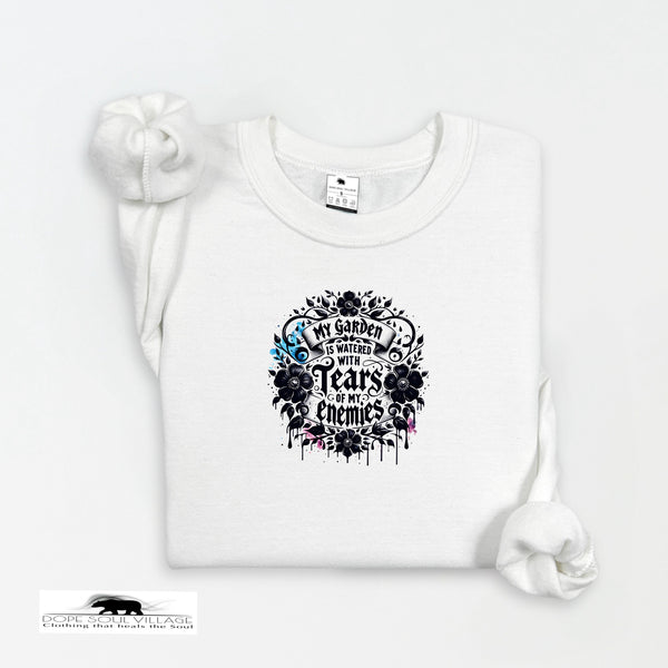 White t-shirt with black floral design and text on a white background