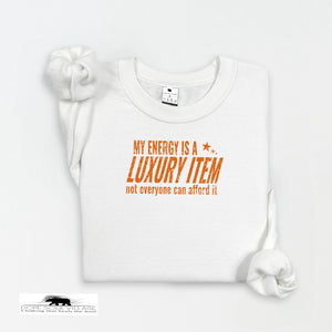White t-shirt with orange text on a white background