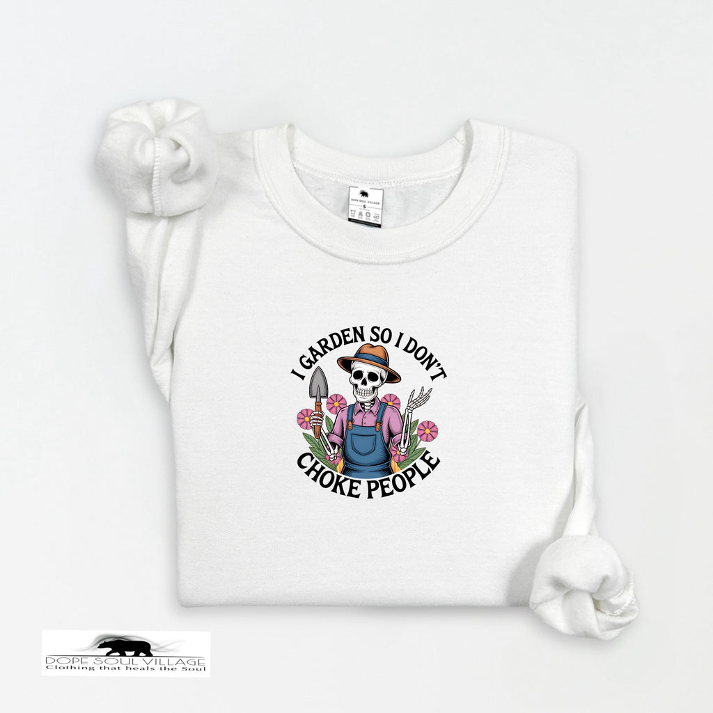 White t-shirt with a graphic design featuring a skeleton gardener and text on a white background.