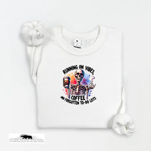 White t-shirt with skeleton design and text on a white background