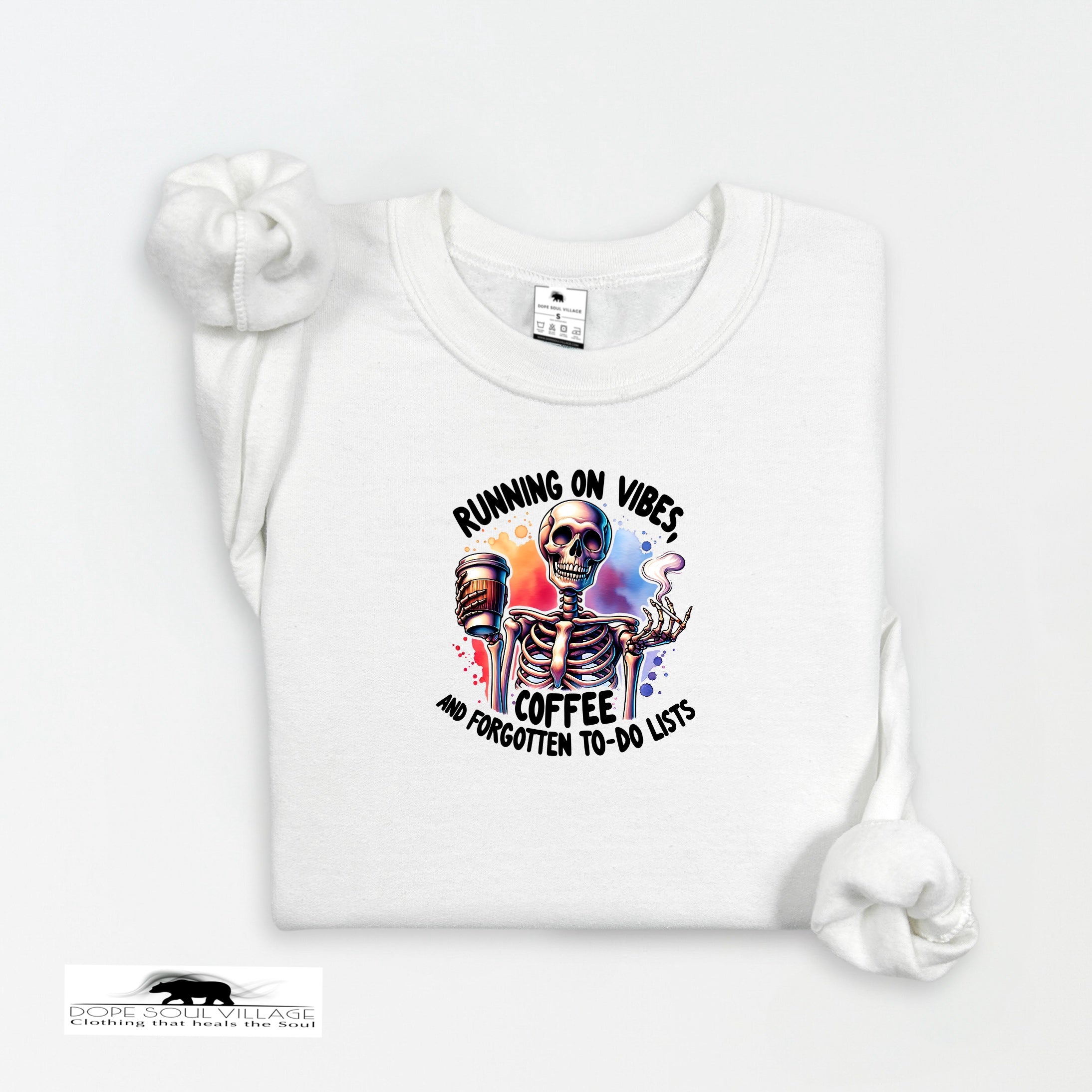 White t-shirt with skeleton design and text on a white background