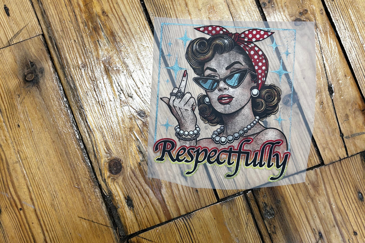 A square vinyl decal or sticker featuring a retro-style illustrated woman with the word 'Respectfully' in script, placed on a rustic wooden floor.