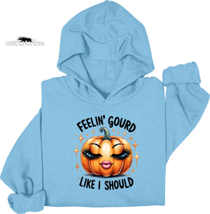 Light blue hoodie with a pumpkin graphic and text on a white background