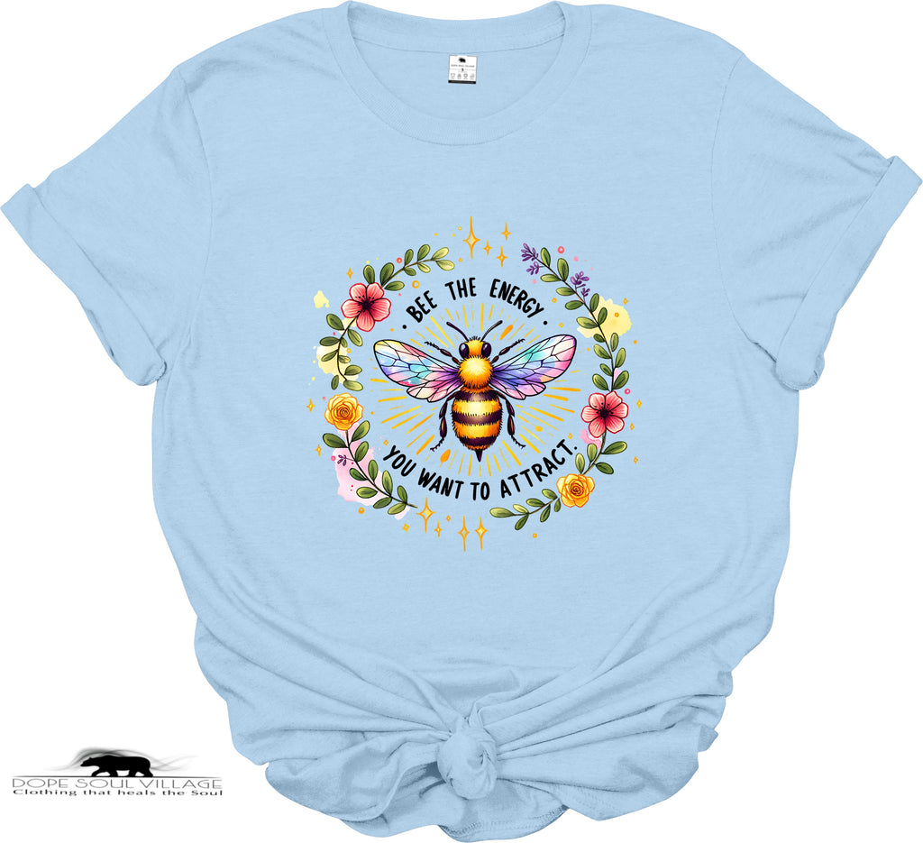 Light blue t-shirt with a colorful bee graphic and text on a white background