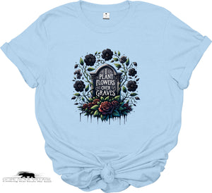 Light blue t-shirt with a graphic design of flowers and text on a white background