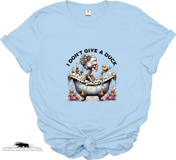 Light blue t-shirt with a graphic design and text 'I Don't Give a Duck' on a white background