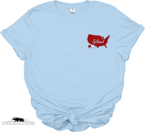 Light blue t-shirt with a red map of the United States and 'Gilead text on a white background.