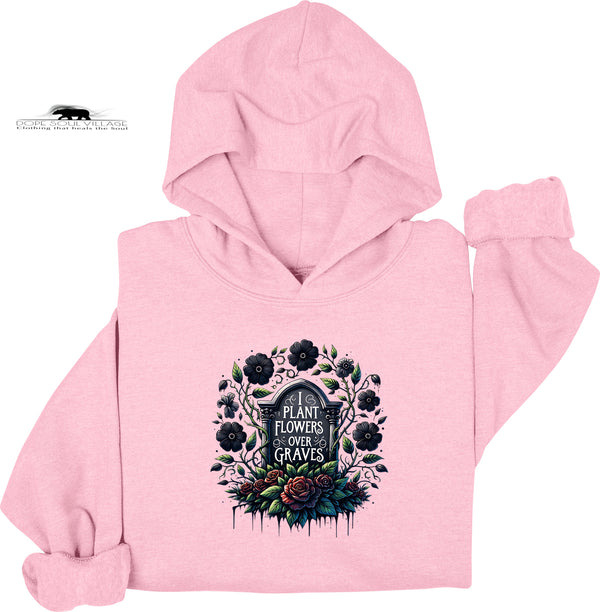 Pink hoodie with floral design and text on a white background