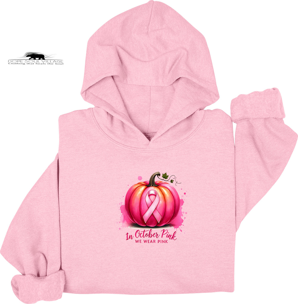Pink hoodie with a pumpkin design featuring a pink ribbon and 'In October Pink We Wear Pink' text on a white background.