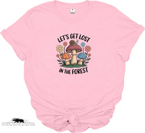 Pink t-shirt with mushroom graphic and text 'Let's get lost in the forest' on a white background
