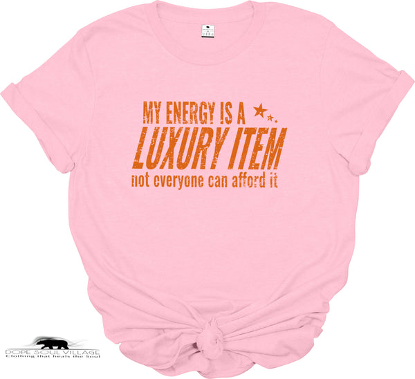 Pink t-shirt with orange text on a white background