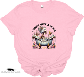 Pink t-shirt with a graphic design and text 'I Don't Give a Duck' on a white background