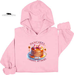 Pink hoodie with a graphic of pancakes and text on a white background