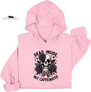 Pink hoodie with skull and roses design and text 'Dead Inside But Caffeinated' on a white background