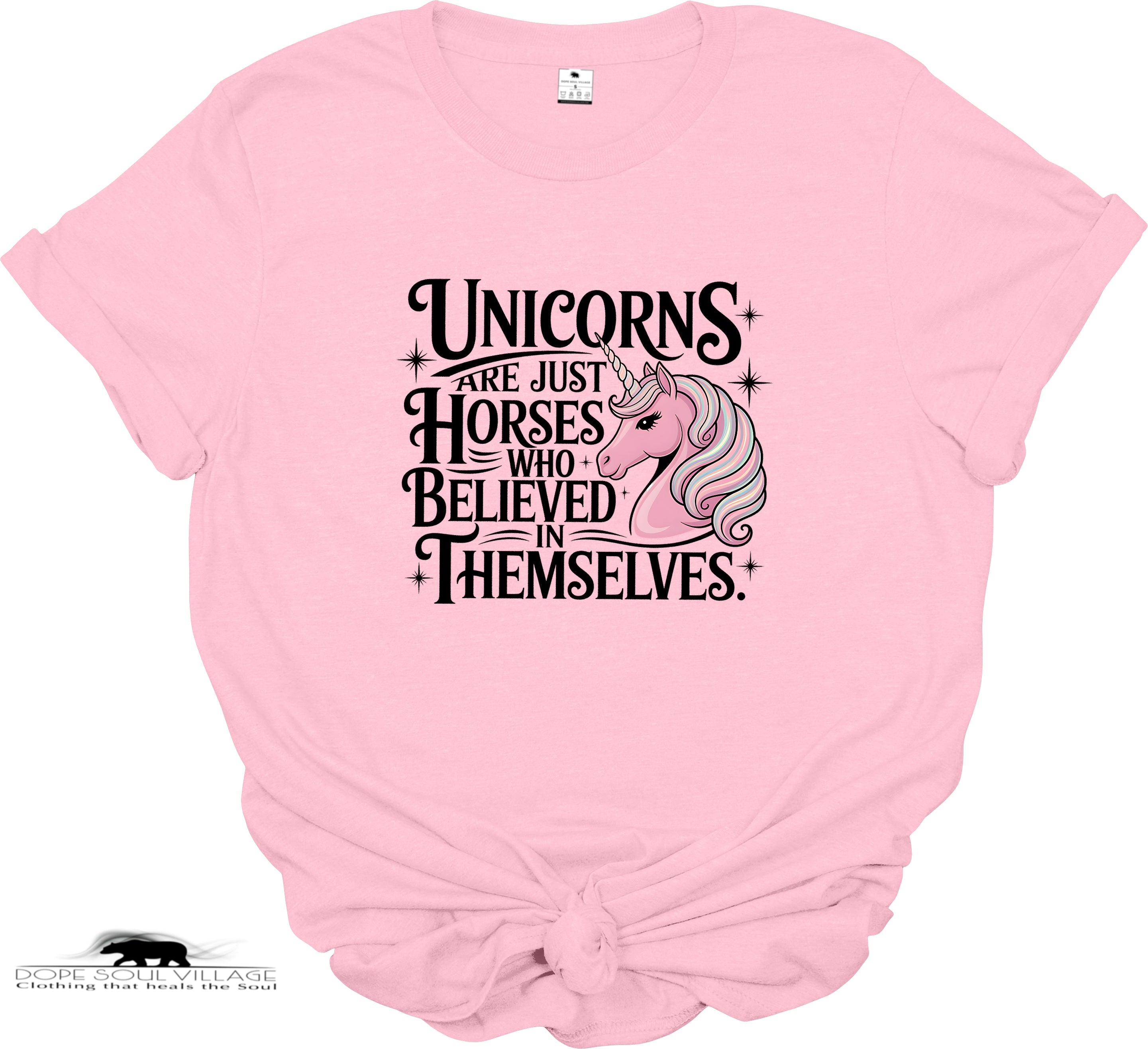 Pink t-shirt with unicorn graphic and text on a white background